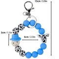 Blauer Silikonperlen-Schlüsselanhänger mit Kuhmuster und dem süßen Smiley-Gesicht - Smiley-Stil / Himmelblau