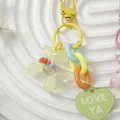 Colorful rainbow chain keychain featuring green balloon dog and 'LOVE YA' heart charm. - Yellow