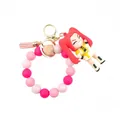 Pulsera llavero de cuentas de silicona KPOP con lindo colgante de personaje anime - Personaje de Pelo Rojo (Monster Hunter Girls)