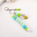 Schattige handgemaakte kralen sleutelhanger met MAMA en DOG MOM letters en groene kwast - Groen