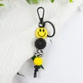 Silikon Perlen Schlüsselanhänger mit gelbem Smiley, schwarzer Blume und Schachbrettmuster - Anhänger Stil (K-1567) / Gelb