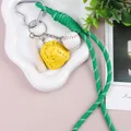 Portachiavi artigianale in corda intrecciata verde con ciondoli da baseball retrò - Verde