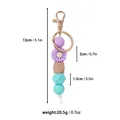 Porte-clés en silicone marguerite avec perle en bois, longueur 5,1 pouces, 20,5g - Marguerite Sauvage / Violet