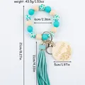 Handmade teal silicone bead keychain bracelet with mama wood charm and leather tassel - Emerald Green