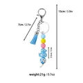 Kleurrijke siliconen kralen sleutelhanger met blauwe kwast en gegalvaniseerde eend hanger - Blauw