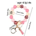 Leopard print silicone bead bracelet keychain with pink tassel and mini cup charm. - Pink