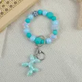 Cute blue balloon dog beaded keychain bracelet with iridescent charm for bags accessory - Blue