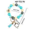 Leopard print silicone bead bracelet keychain with light blue tassel and mini cup charm detail - Lake Blue