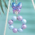 Lindo llavero de mariposa con cuentas irisadas violetas y azules para bolsos de mano - Azul Púrpura