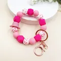 Siliconen kralen sleutelhanger armband met roze koeprint en cowboyhoed bedeltje - Nieuwe Western Stijl (K-880) / Roze