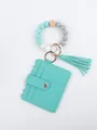 Detail of beaded wristlet keychain with turquoise PU card holder and tassel pendant - Green Gemstone Style