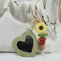 Green heart-shaped PU leather mirror keychain with sunflower charm and wooden beads - Army Green