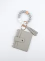Detailed view of gray beaded wristlet keychain with PU leather card holder and matching tassel - Space Gray Style