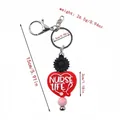 Adorable red heart silicone keychain with NURSE LIFE text and black daisy flower charm - Red