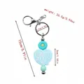 Light blue silicone heart keychain with daisy charm and Nurse Life engraved text - Blue