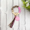 Detailed view of leopard silicone bead keychain with tassel and pink heart mama charm - Pink Style (K-1016)