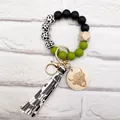 Highland cow silicone beaded keychain with cow print beads and leather tassel charm - Olive Green (K-1012)