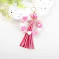 Pink and white marble silicone bead bracelet keychain with matching long tassel detail - Pink and White Marble (K305)