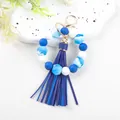 Blue and white 14mm silicone bead bracelet keychain with octagonal beads and tassel - Blue and White Marble (K309)
