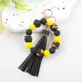 Sunflower themed silicone beaded keychain bracelet with large black leather tassel - Black Yellow Sunflower