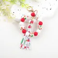 Christmas themed silicone bead wristlet keychain with festive patterns and tassel - Christmas Red White