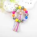 Colorful 14mm silicone bead bracelet keychain with leopard patterns and stripe tassel. - Colorful Leopard
