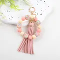 Handmade 14mm pink silicone octagonal bead bracelet keychain with stylish leather tassel - Printed Pink