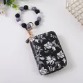 Floraler Akkordeon-Kartenhalter mit stilvollem Silikon-Perlenarmband-Schlüsselanhänger - Schwarz Weiß Blumen Stil (K-2044)