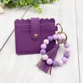 Elegant purple PU leather card holder with silicone bead bracelet and matching tassel keychain - Bracelet Card Holder Set / Purple