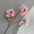 Close-up detail of a three-headed pink artificial peony flower branch for wedding decor - Pink