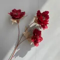 Detailed view of three-headed artificial red peony with vintage cream leaves decoration - Red