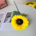 Detailed close-up view of a realistic artificial sunflower with vibrant yellow silk petals. - Single Sunflower