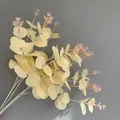 Detailed view of cream artificial 16-fork eucalyptus stems with silk-screened leaves - 16 Branches Eucalyptus (YD202230) / Silk Screen Champagne