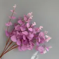 Detail showing the purple and pink gradient leaves of the artificial eucalyptus - 16 Branches Eucalyptus (YD202230) / Non-woven Light Purple