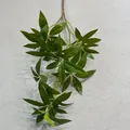 Detailed view of artificial Pachira leaves with realistic texture for home decor. - Green
