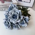 Detailed view of the 7-head artificial blue rose bouquet with realistic fabric texture - Fog Blue