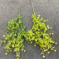 Detailed view of artificial greenery stems for forest themed wedding decorations - Green Plant 03