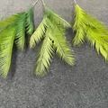 Detail view of artificial cycad palm leaves in three shades of green for wedding decor layout. - Cycas Leaf Style / 100cm / Green Plant 11 (Three-Color Set)