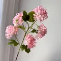 Detailed view of realistic pink hydrangea petals and lush green leaves for home decor - 5-Head Pink Hydrangea