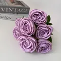 Close-up view of 7-head purple silk roses bouquet for elegant wedding and home decoration. - Purple