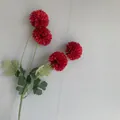 Close-up detail of a realistic four-head red artificial ball chrysanthemum flower branch - 10 Piece Set / Red