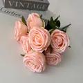 Detailed close-up of realistic 7-head artificial pink rose bouquet for wedding decor - Champagne
