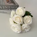 Close-up of 7-head white artificial rose bouquet for wedding decor and home table display - White