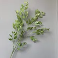 Detailed view of lifelike artificial banyan leaves for wedding and home decoration. - Light Green