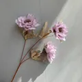 Detailed macro view of a 3-headed artificial purple peony flower for wedding decor - Purple