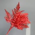 Vibrant red artificial fern leaf plastic foliage for wedding and home decoration - Red