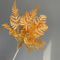 Vibrant orange artificial fern leaf for decorative flower arrangements and home decor - Orange