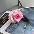 Elegante einzelne rosa künstliche Seidenrose für Innen- und Hochzeitsdekoration - Mädchen Rosa