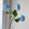Detailed view of realistic 3-head blue hydrangea artificial flower for home decoration. - Blue