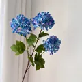 Detailed view of realistic 3-head artificial hydrangea flowers in vibrant blue and purple - Blue Purple
